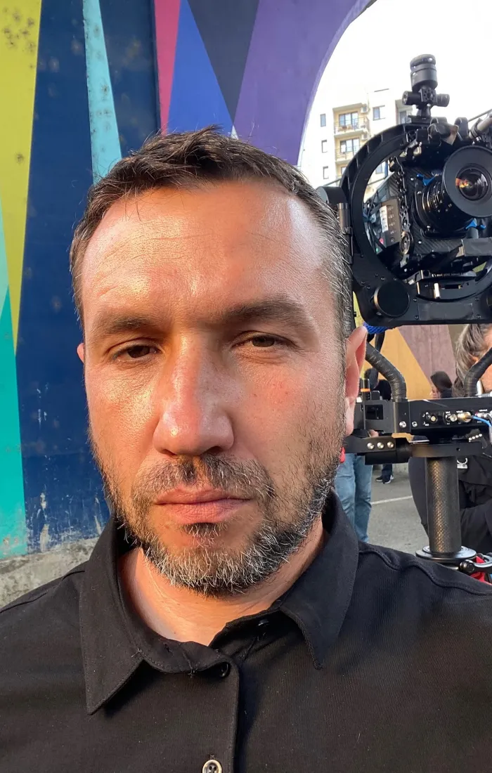 Roman Kantsir on set with a camera rig
